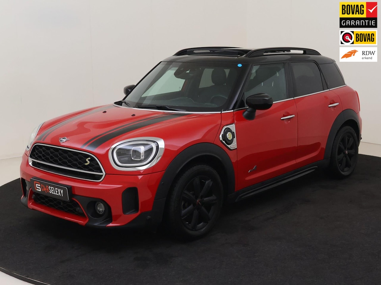 MINI Countryman - Mini 1.5 Cooper S E ALL4 Pano/H&K/Memory - AutoWereld.nl