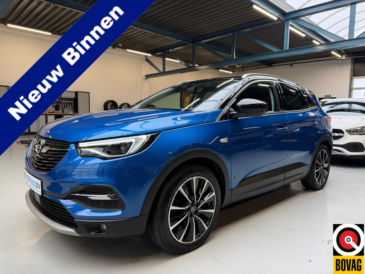 Opel Grandland X - 1.6 Turbo Hybrid4 Ultimate Leer Trekhaak LED DAB Stoelverwarming en ventilatie Elek Stoelv - AutoWereld.nl