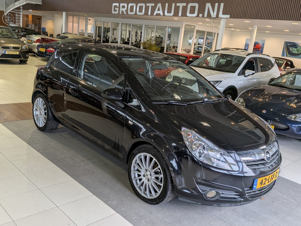 Opel Corsa - 1.4-16V Color Edition Airco, Cruise Control, Stuurbekrachtiging - AutoWereld.nl