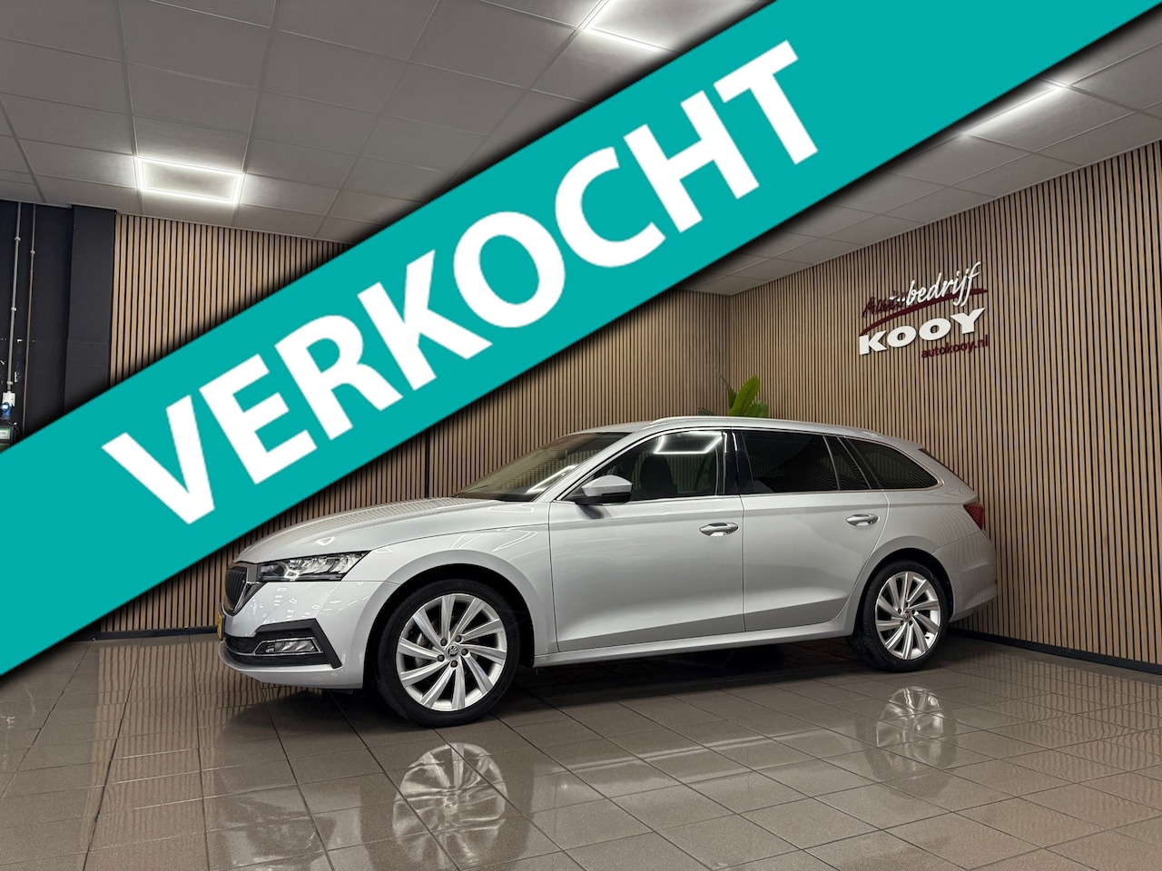 Skoda Octavia Combi - 1.0 TSI Business Edition * Trekhaak / Navigatie / 18" LM Velgen / NL Auto * - AutoWereld.nl