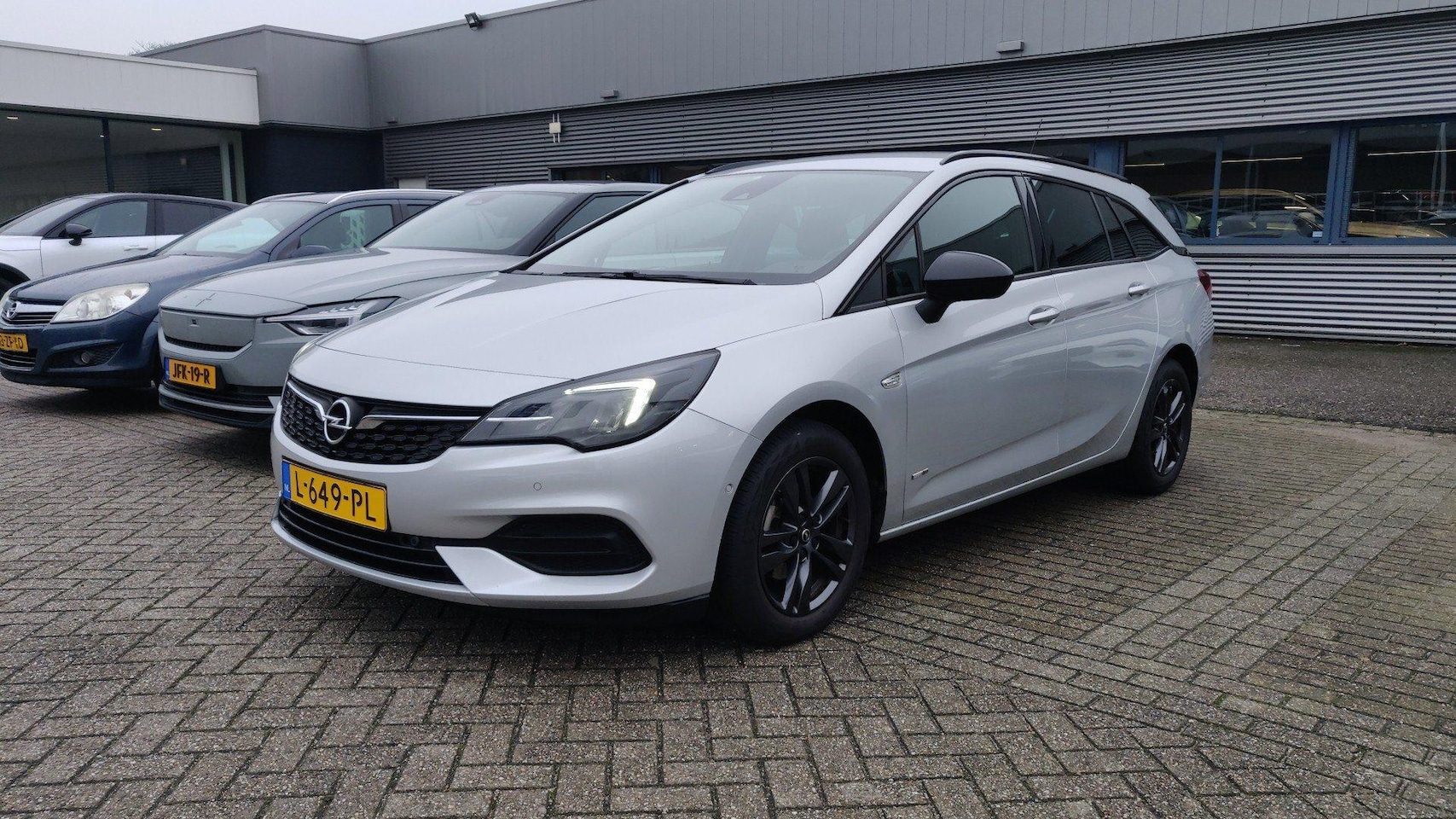 Opel Astra Sports Tourer - 1.2 Design & Tech / Nederlandse Auto / Apple Car Play / Climate control / Stuurverwarming - AutoWereld.nl