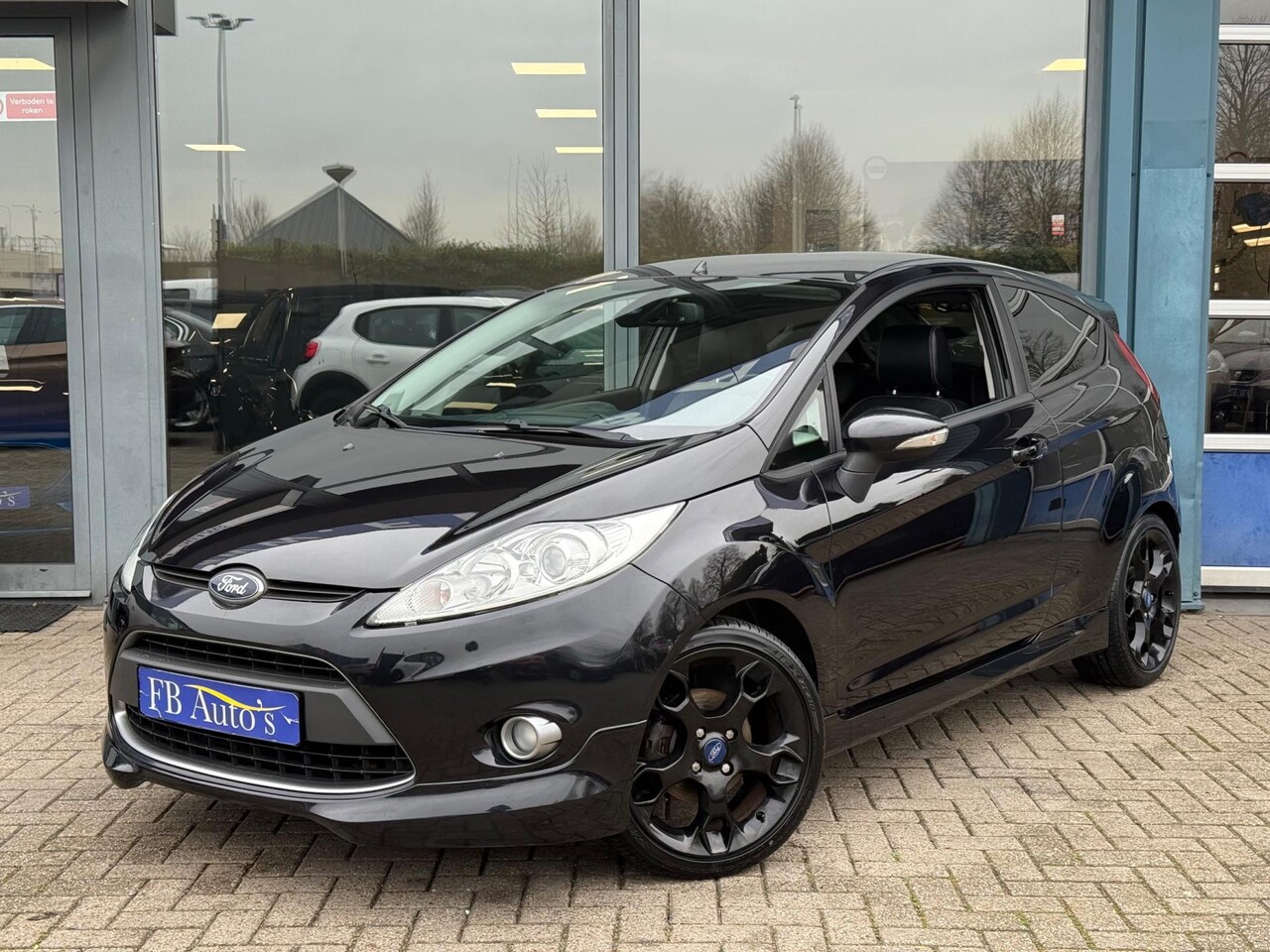 Ford Fiesta - 1.6 Metal Airco Lmv Leer Stoelverw. - AutoWereld.nl