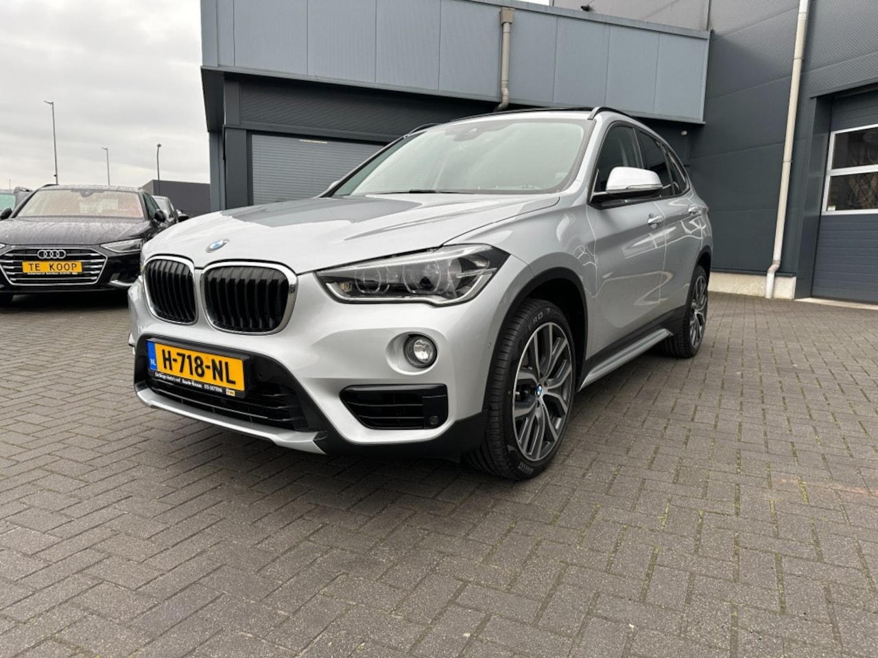 BMW X1 - sDrive 1.8i High Executive Sport Edition Camera schuifdak Trekhaak - AutoWereld.nl