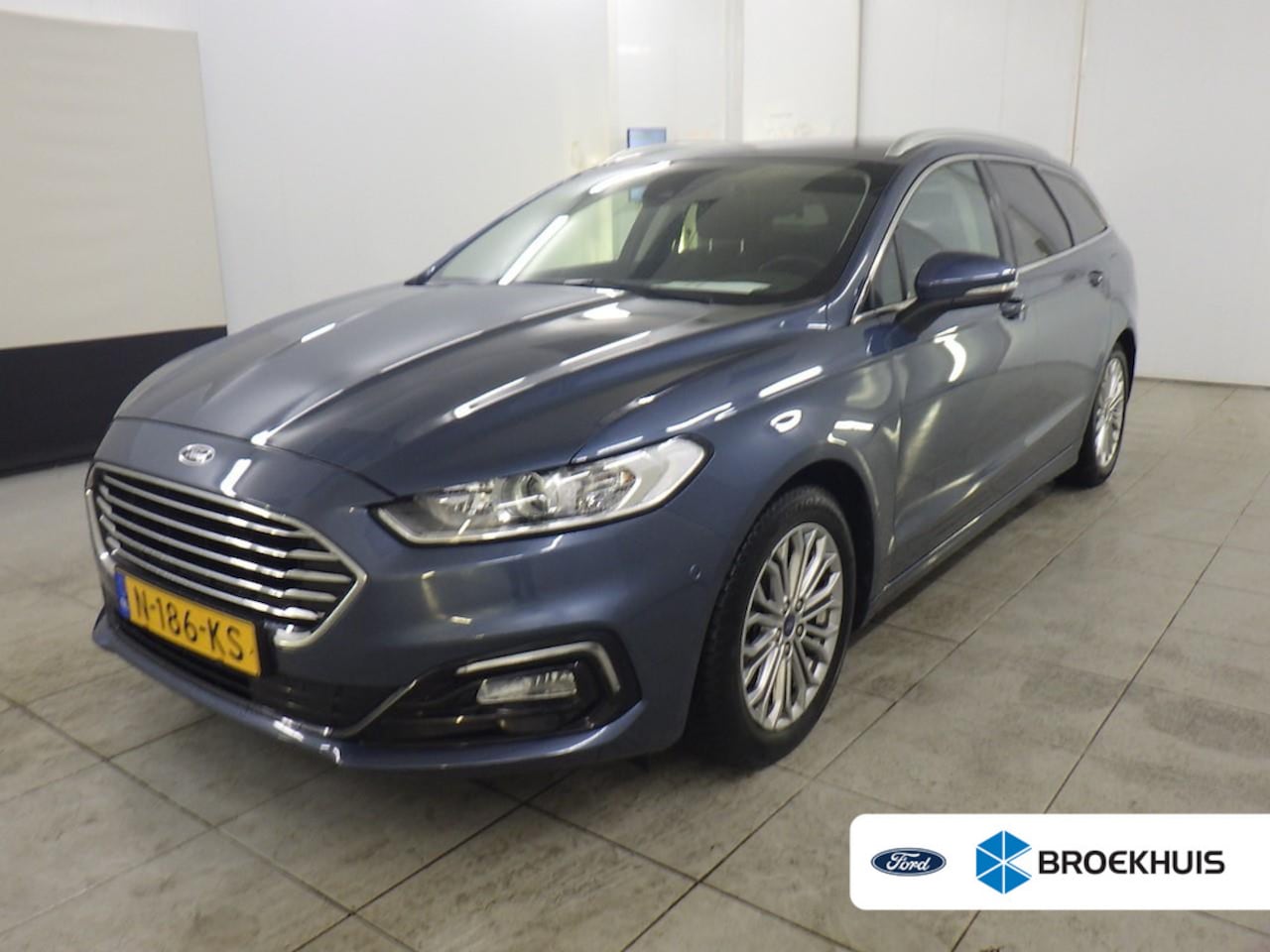 Ford Mondeo Wagon - 2.0 IVCT HEV Titanium | Camera | Privacy Glass | Navigatie | Cruise Control | Stoelverwarm - AutoWereld.nl
