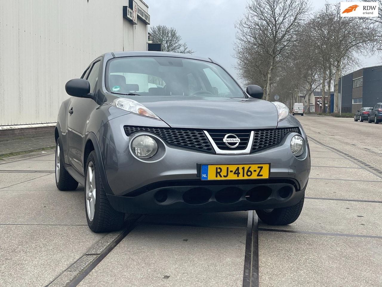 Nissan Juke - 1.6 Acenta 2011 Airco Grijs - AutoWereld.nl