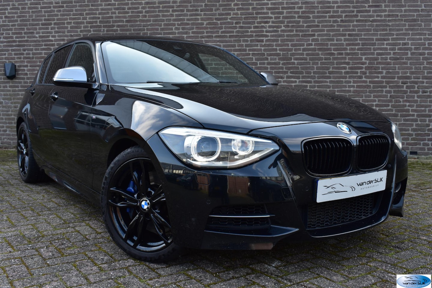 BMW 1-serie - M135i xDrive High Executive Schuif / Kanteldak, Harman Kardon, PDC - AutoWereld.nl