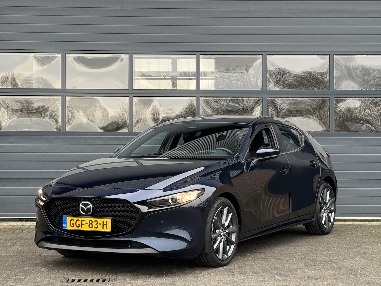 Mazda 3 - 2.0 E-SKYACTIV-X M HYBRID 186 HOMURA I P-CAMERA I ADAPTIVE CRUISE CONTROL I NAVIGATIE I CL - AutoWereld.nl