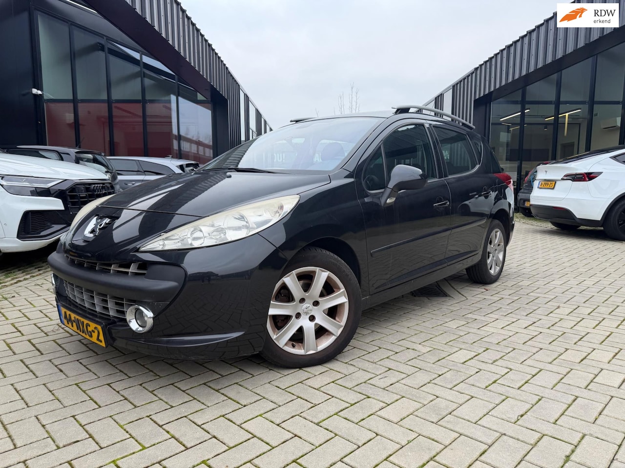 Peugeot 207 SW - 1.6 VTi X-line Clima Automaat Export - AutoWereld.nl