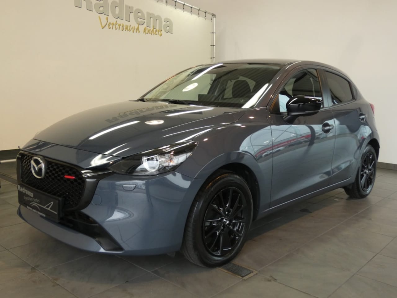 Mazda 2 - sedan Homura - AutoWereld.nl