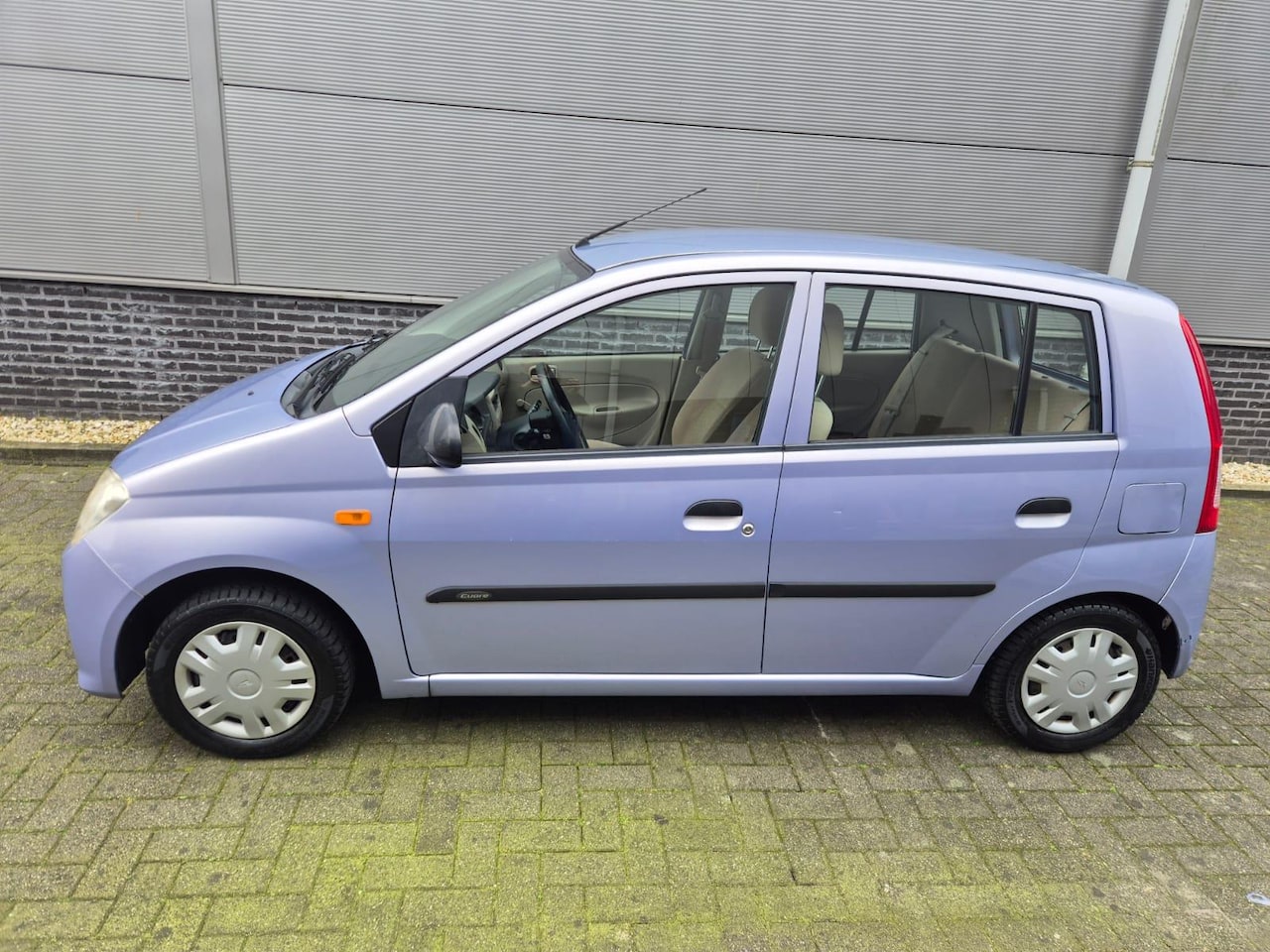 Daihatsu Cuore - 1.0-12V Azure - apk 19 februari 2027 - AutoWereld.nl