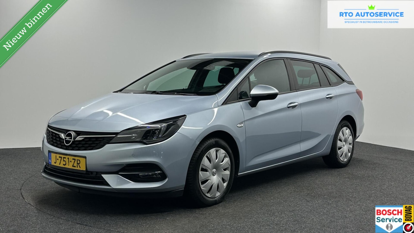 Opel Astra Sports Tourer - 1.2 Business Executive CAMERA TREKHAAK ECC NAVI CARPLAY 146 PK. - AutoWereld.nl