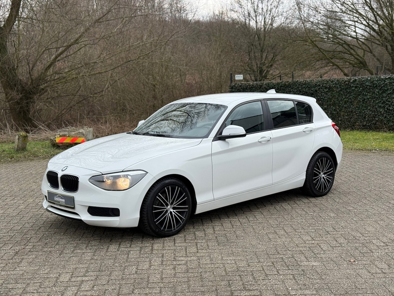 BMW 1-serie - 116i High Executive CARPLAY I VOLL ONDH I ZEER MOOI I NWE PAK - AutoWereld.nl
