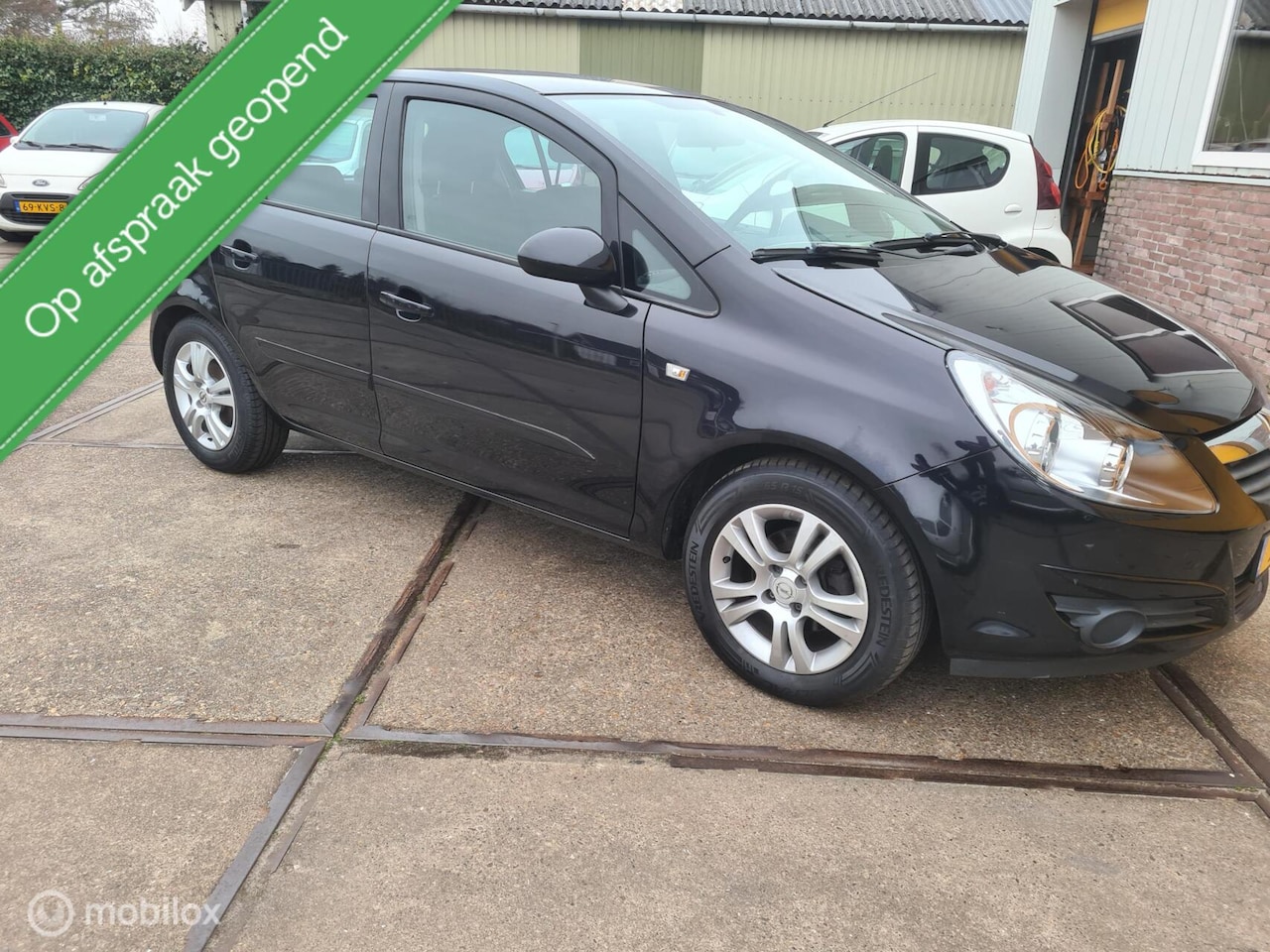 Opel Corsa - 1.4-16V Enjoy bj 2007 - AutoWereld.nl