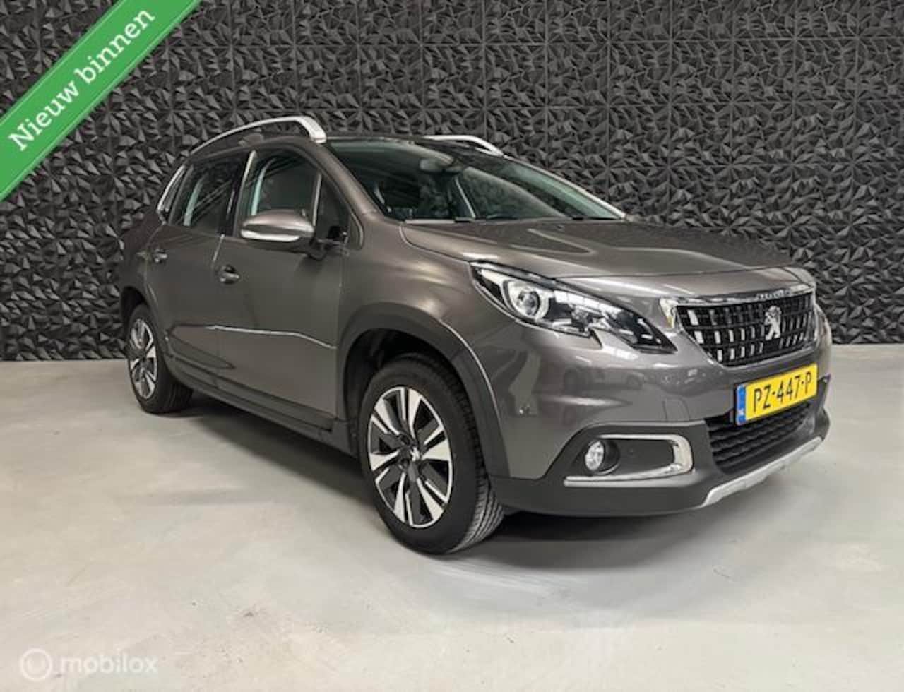 Peugeot 2008 - 1.2 PureTech Allure | Camera | Rijklaarprijs - AutoWereld.nl