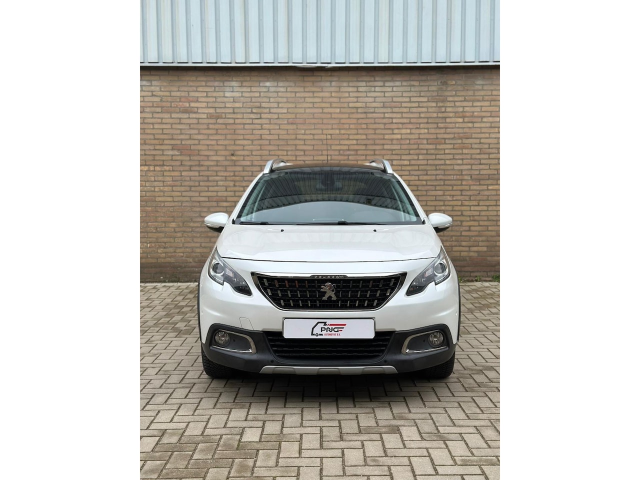 Peugeot 2008 - 1.2 PureTech Blue Lease Executive PANO - CRUISE - CAMERA - AutoWereld.nl