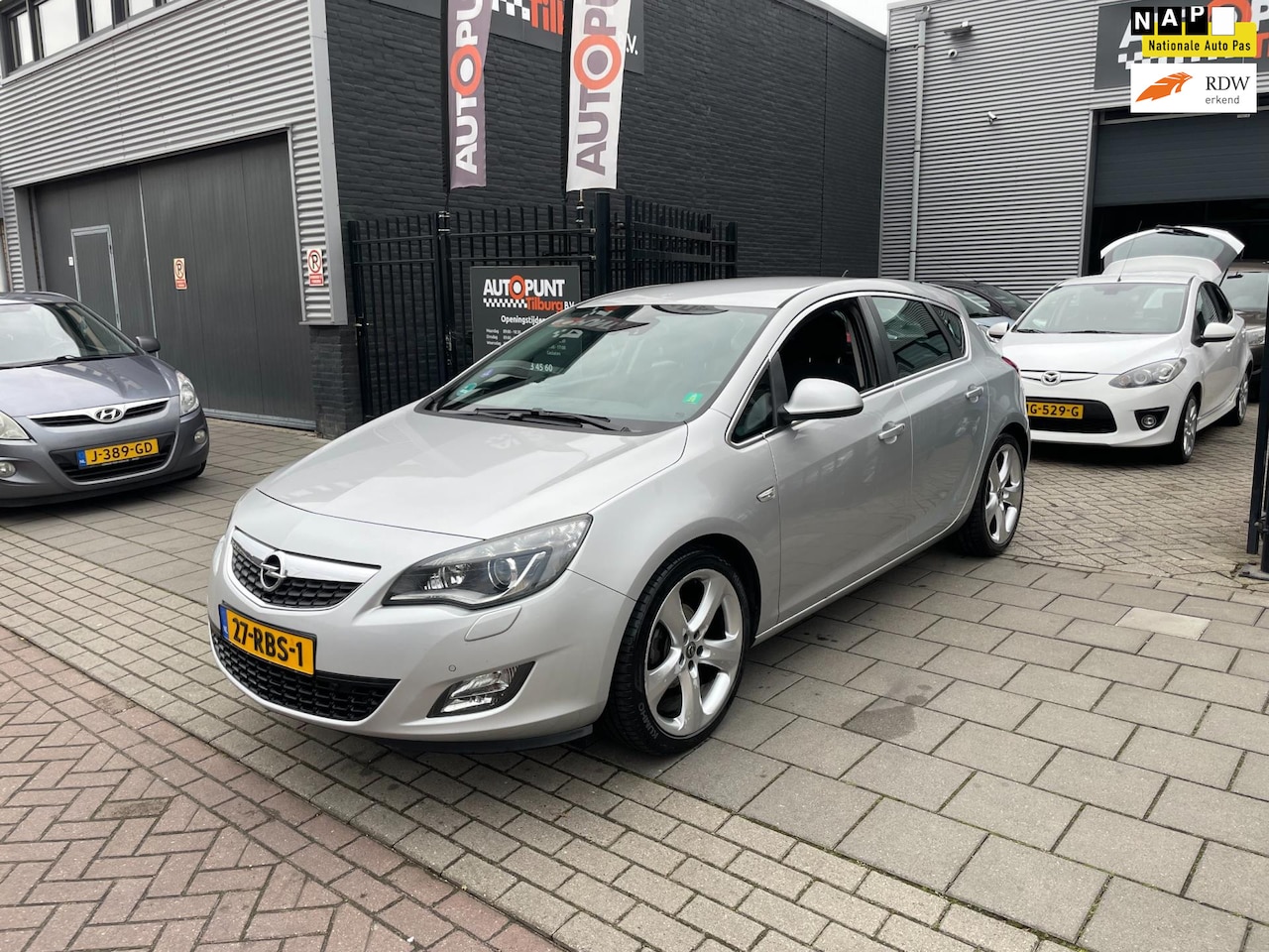 Opel Astra - 1.4 Turbo Sport 3e Eigenaar! Airco Navi PDC NAP APK - AutoWereld.nl