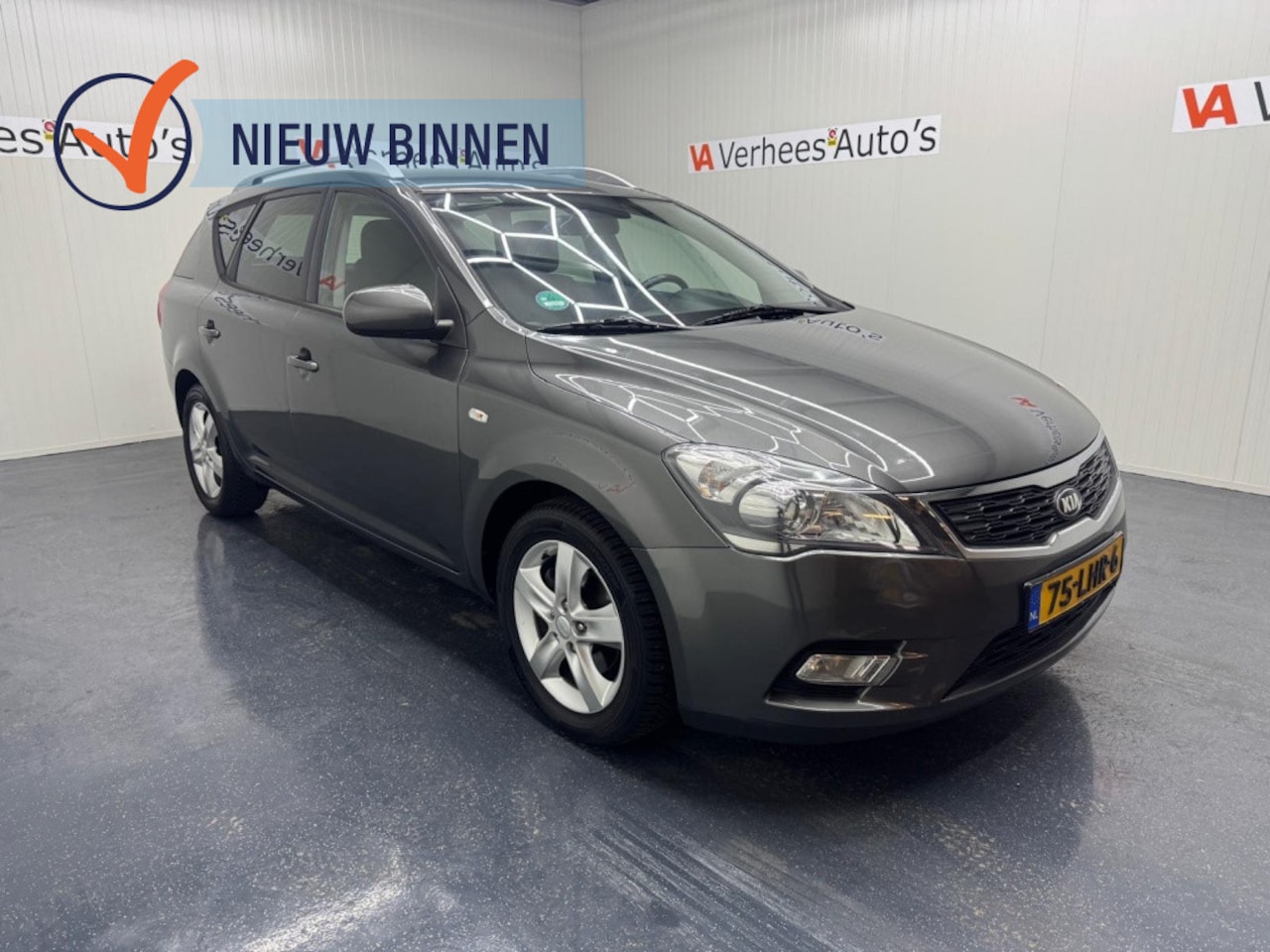 Kia Cee'd - 1.4 CVVT X-ecutive 1.4 CVVT X-ecutive - AutoWereld.nl
