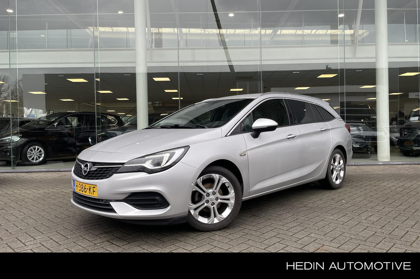 Opel Astra Sports Tourer - 1.2 Elegance | Navigatie | Camera achter | Trekhaak - AutoWereld.nl