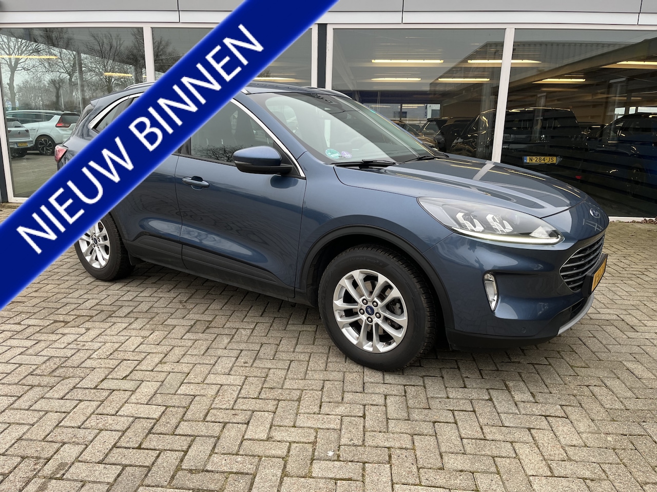 Ford Kuga - 1.5 EcoBoost Titanium/Camera/Carplay/Clima - AutoWereld.nl