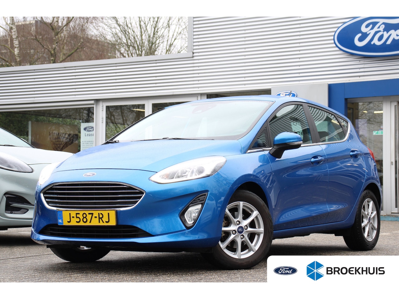 Ford Fiesta - 1.0EB Titanium | NL-AUTO! | 1E EIGENAAR! | WINTERPACK | CRUISE | CLIMA | NAVI | DEALER OH! - AutoWereld.nl