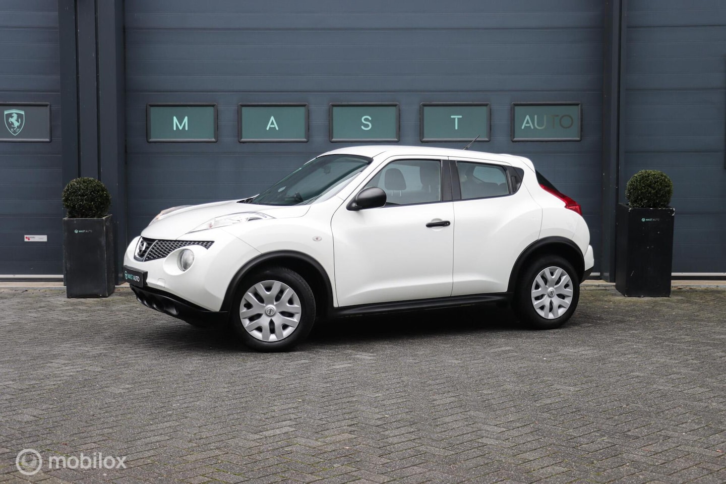 Nissan Juke - 1.6 Visia Eco|Apple carplay|Trekhaak|NAP|Airco - AutoWereld.nl