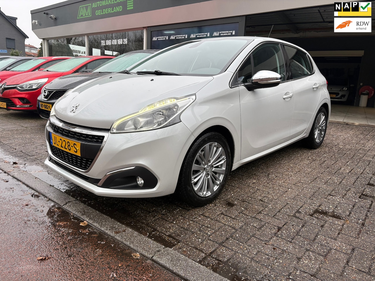 Peugeot 208 - 1.2 PureTech Allure | 2E EIGENAAR | 12MND GARANTIE | NAVI | AIRCO | CRUISE | - AutoWereld.nl