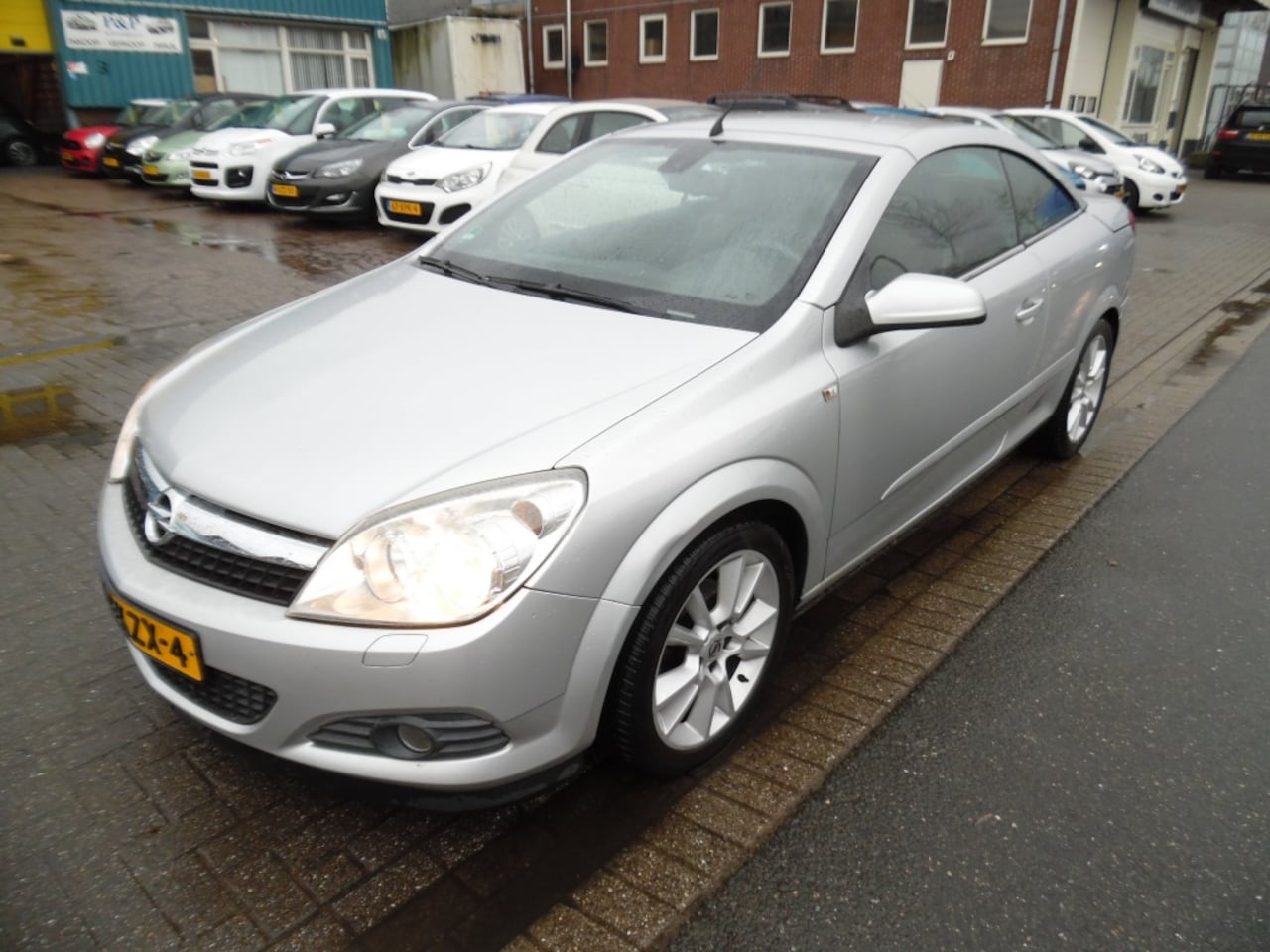 Opel Astra TwinTop - apk 2.27 NAP 1.8 Enjoy airco navi 1e eign - AutoWereld.nl