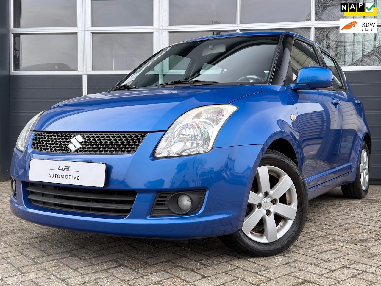 Suzuki Swift - 1.3 Bandit / 2e eig. / Clima / 5-drs - AutoWereld.nl