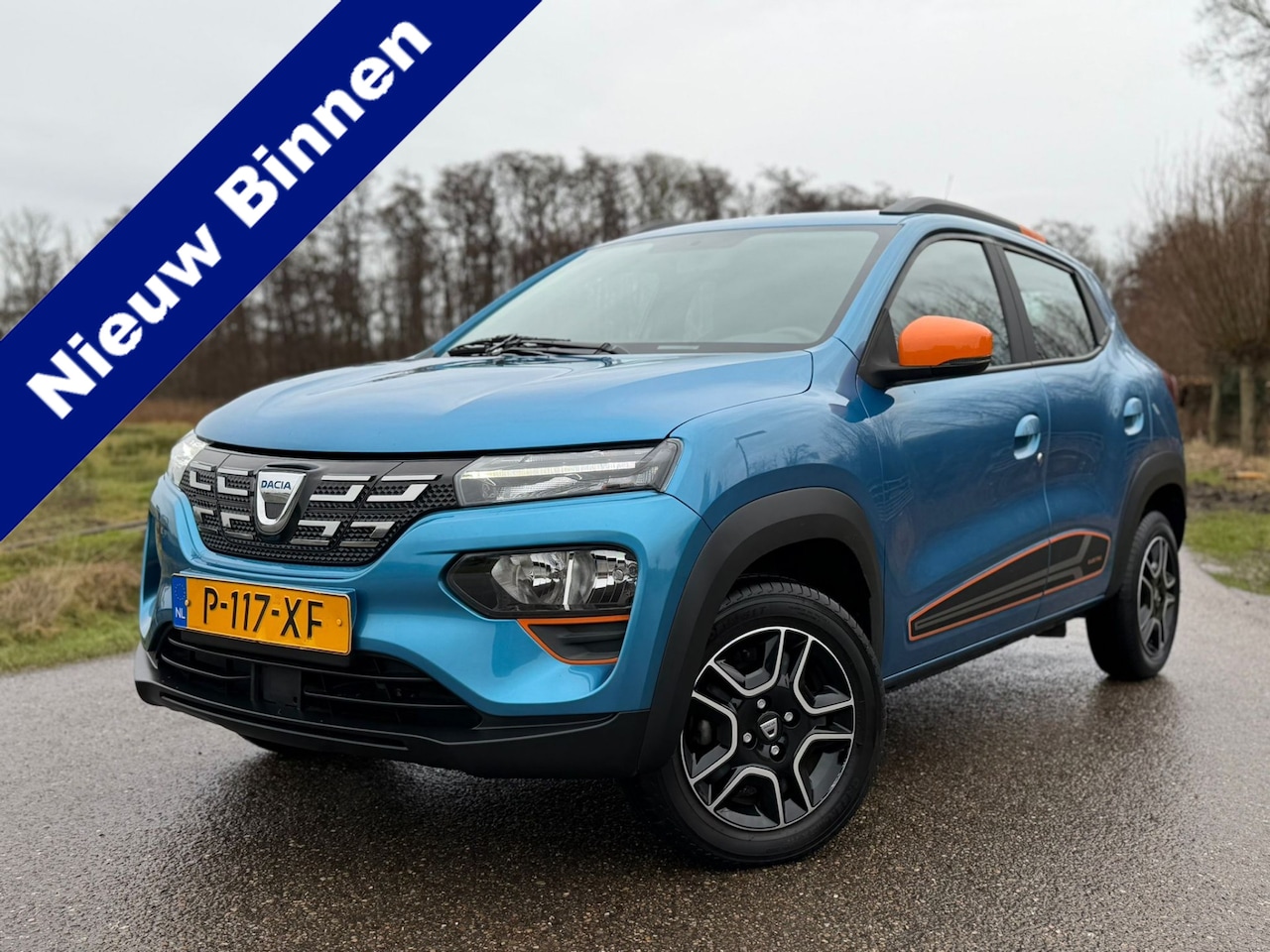 Dacia Spring - Comfort Plus 27 kWh / Full Electric / Automaat / Airco / Navi / Leder / Camera / Cruise Co - AutoWereld.nl