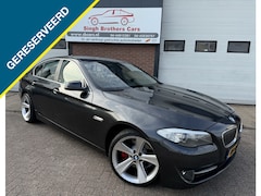 BMW 5-serie - 523i EXE AUT LEER NAVI XENON Y-TIMER INRUIL MOG