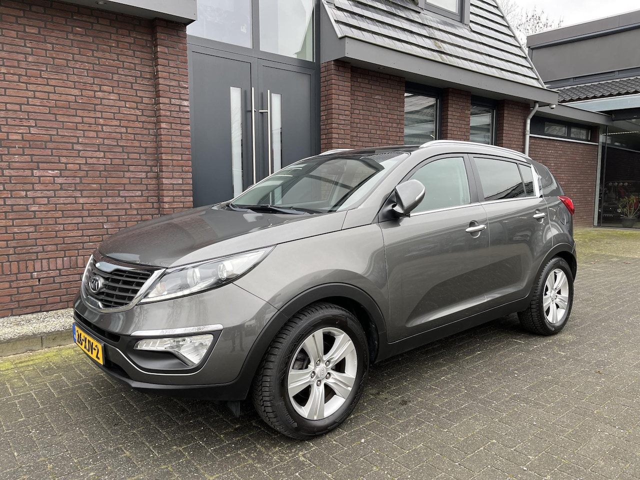 Kia Sportage - 1.6 GDI X-ecutive Plus Pack NAV | CRUISE CONTROL | PANORAMADAK | HALF LEDER | LED | CAMERA - AutoWereld.nl
