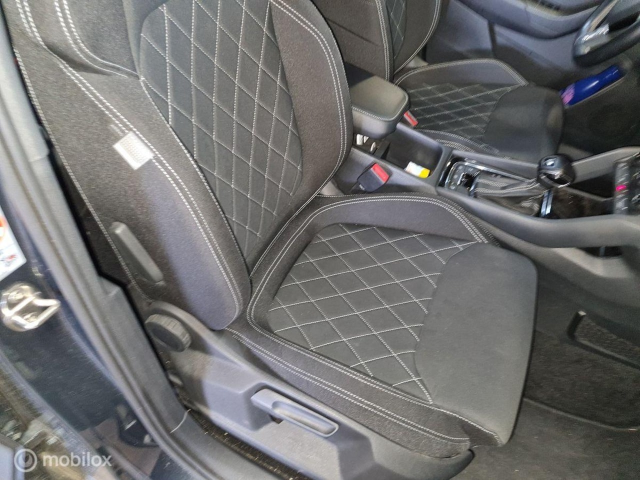 Skoda Karoq - 1.5 TSI ACT Sportline Virtual Bucket Seats Navi Carplay ACC Camera - AutoWereld.nl