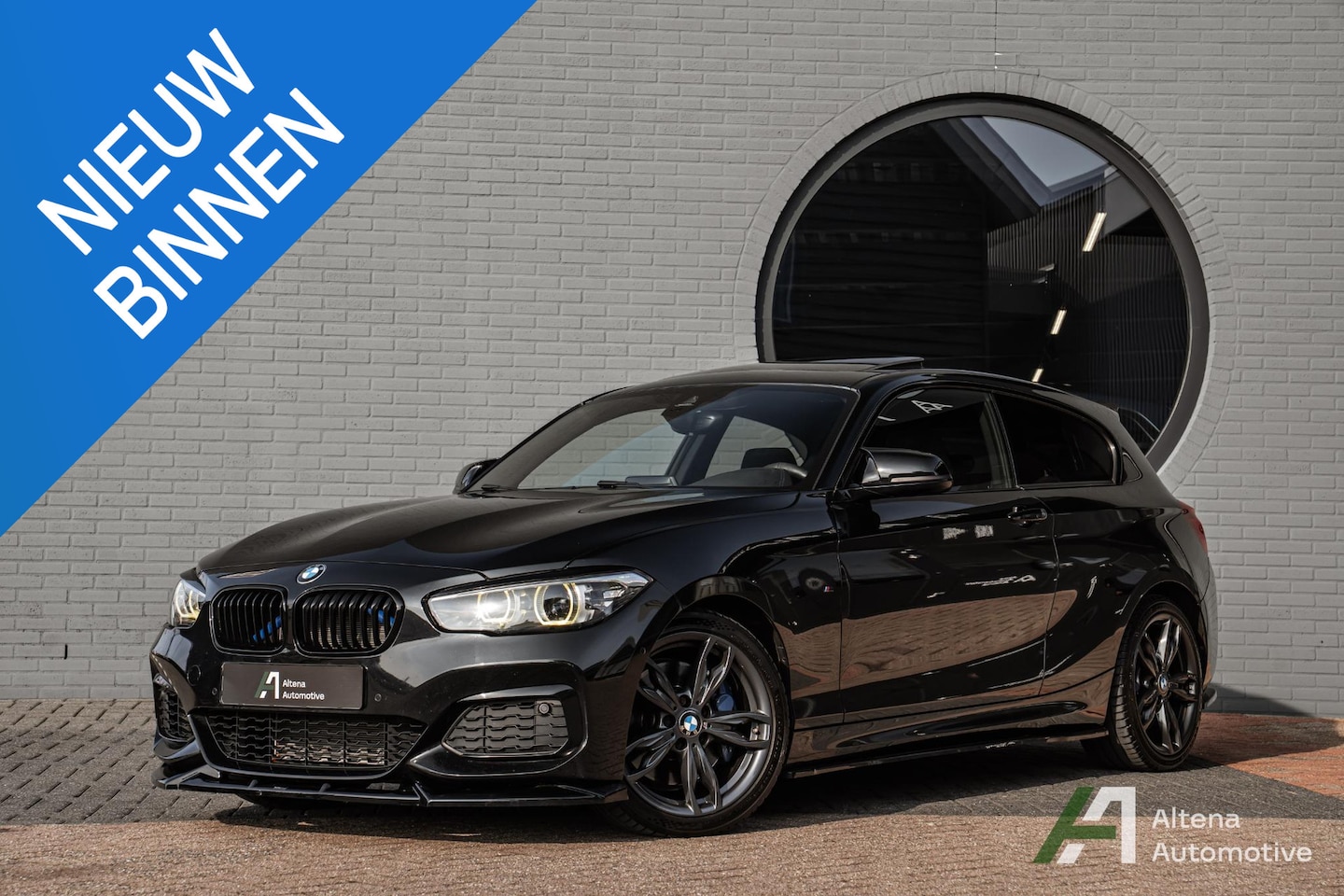 BMW 1-serie - M140i Edition Shadow Executive Maxton, schuifdak, camera, elektrische stoelen, hifi - AutoWereld.nl