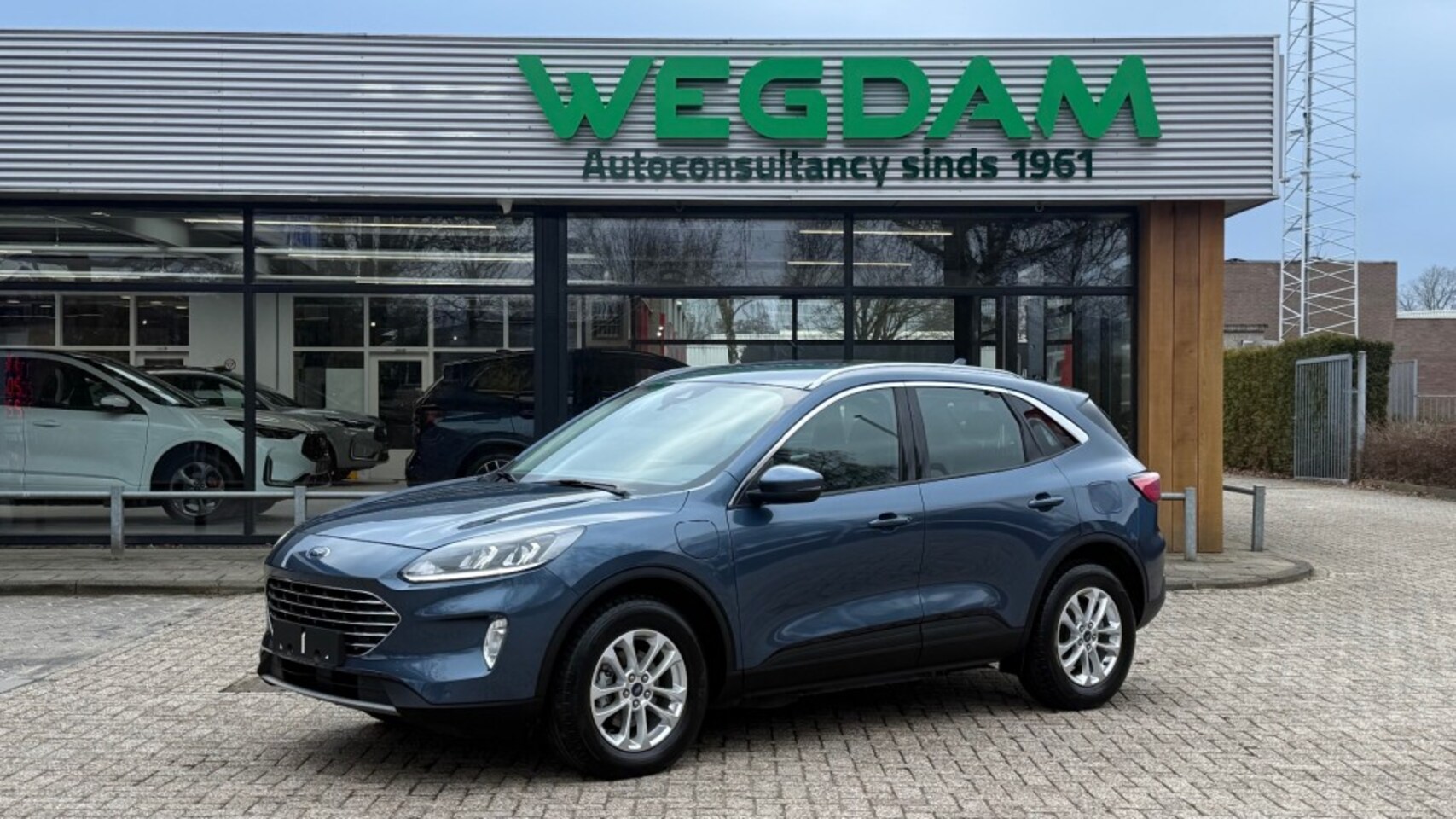 Ford Kuga - 2.5 PHEV TITANIUM / Winter pack - AutoWereld.nl