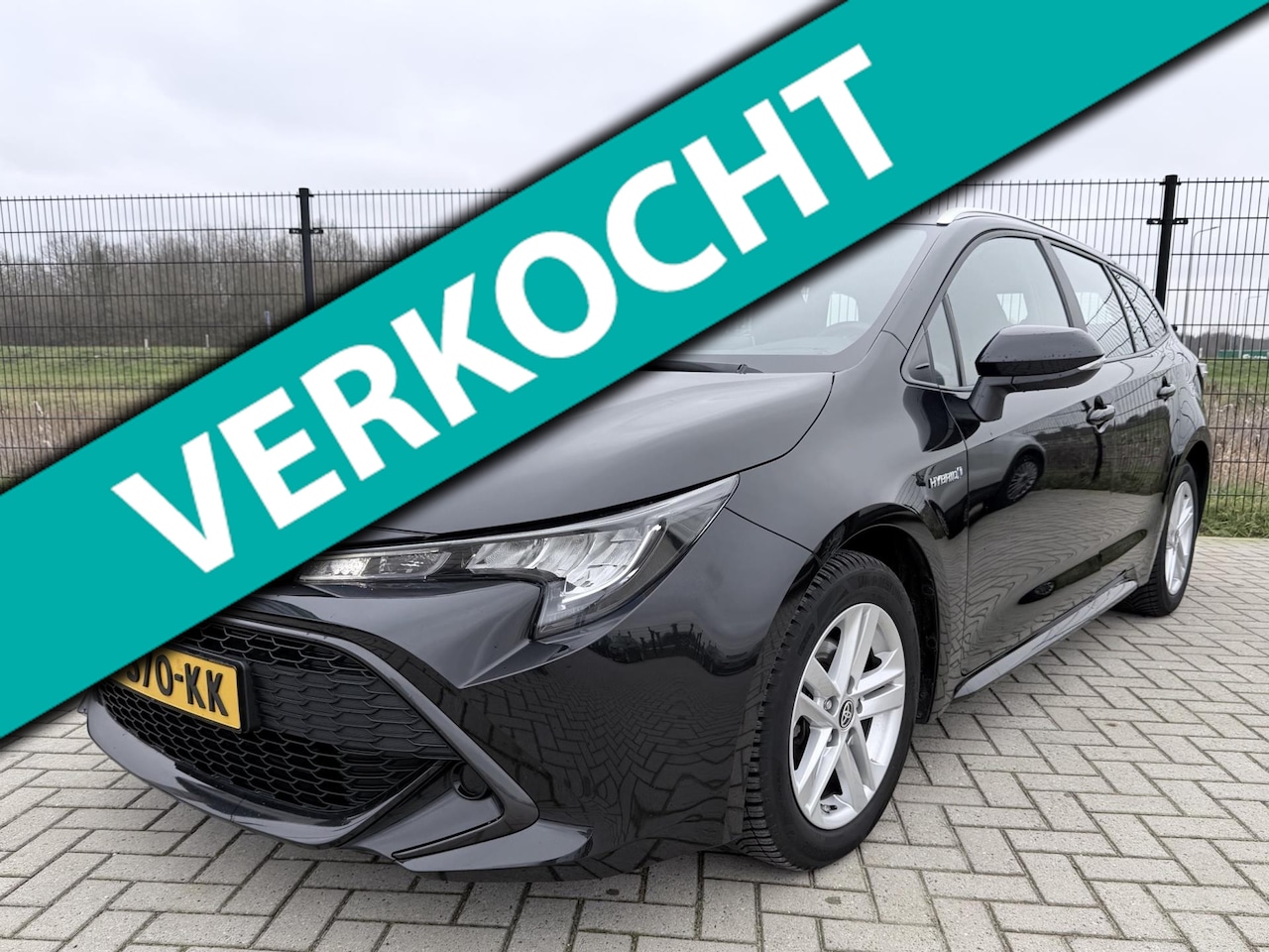 Toyota Corolla Touring Sports - 1.8 Hybrid Active | Camera | Navi | Lane Assist | Cruise Control - AutoWereld.nl