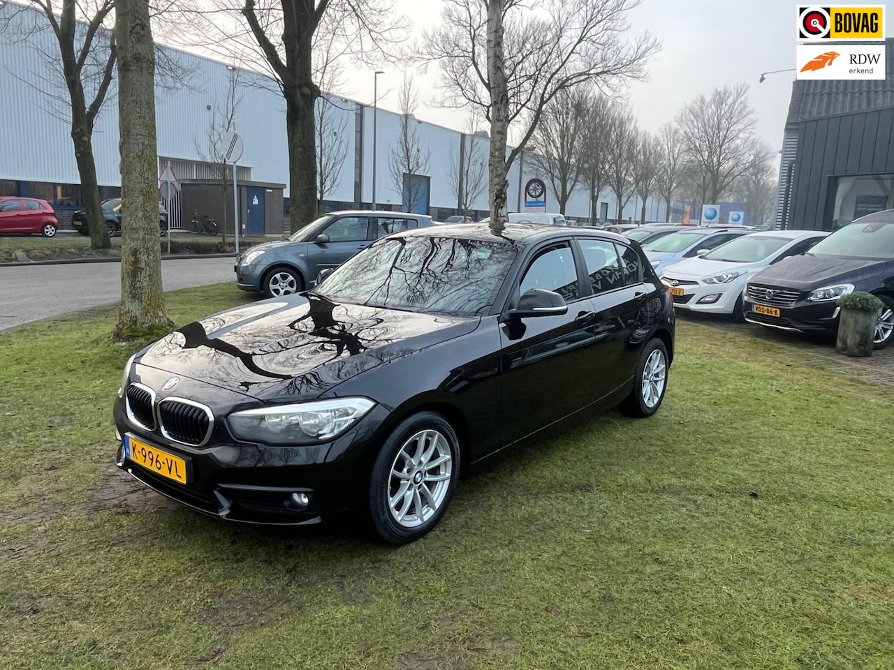 BMW 1-serie - 116i Centennial Executive * ABS * Cruisecontrol * P-camera * LM velgen * bluetooth * audio - AutoWereld.nl