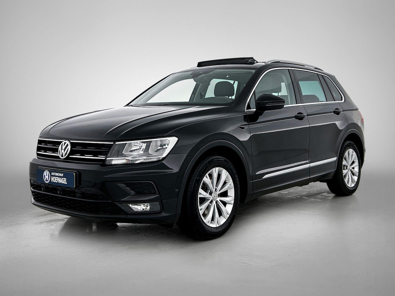 Volkswagen Tiguan - 1.4 TSI ACT Comfortline Business | Adaptive cruise | Stoelverwarming | Navigatie | schuif - AutoWereld.nl