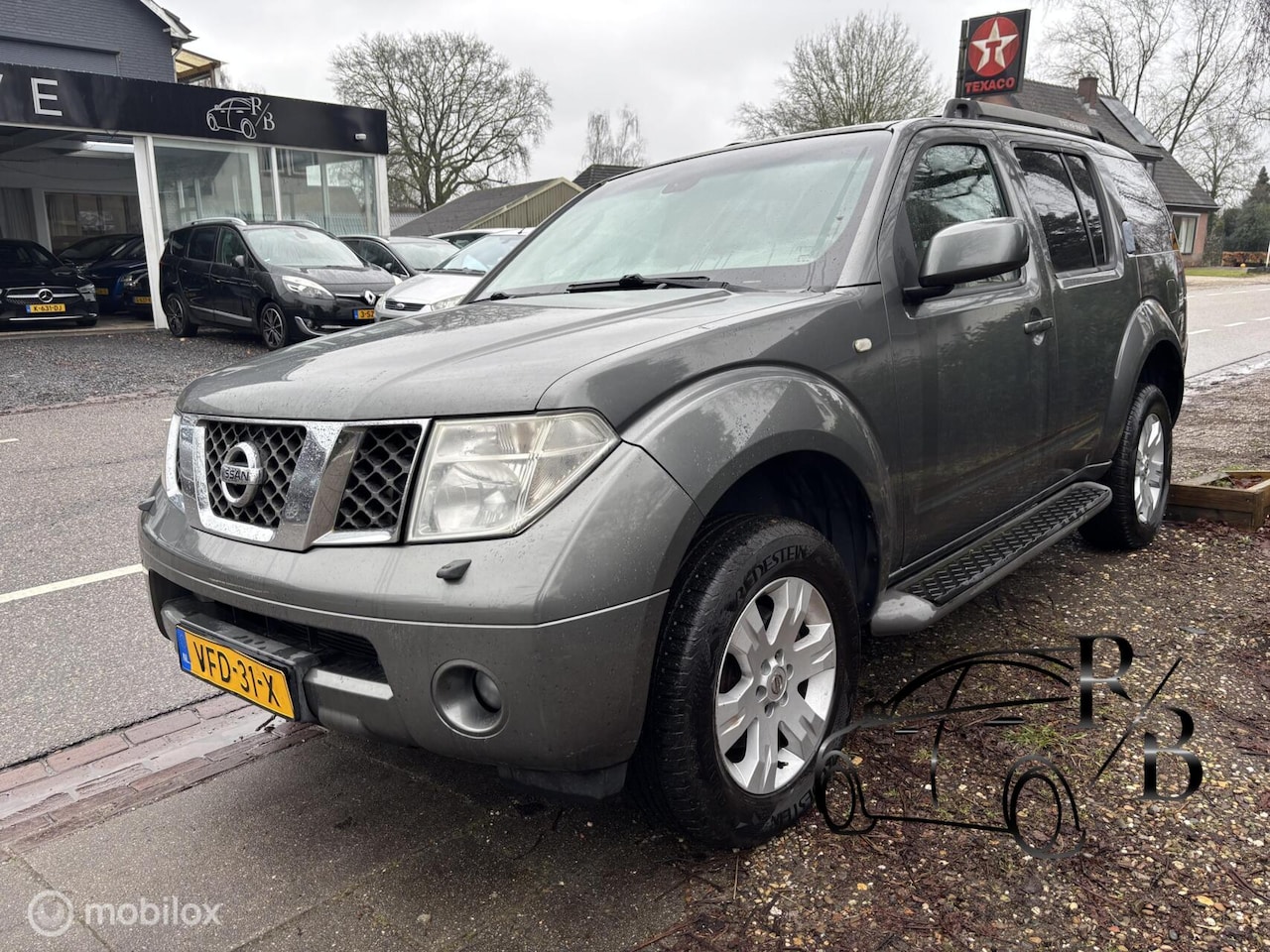 Nissan Pathfinder - 2.5 LE Premium 4WD EXPORTPRIJS LEES TEKST - AutoWereld.nl
