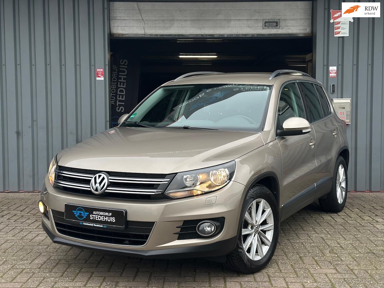 Volkswagen Tiguan - 1.4 TSI Sport&Style CarPlay | Trekhaak - AutoWereld.nl