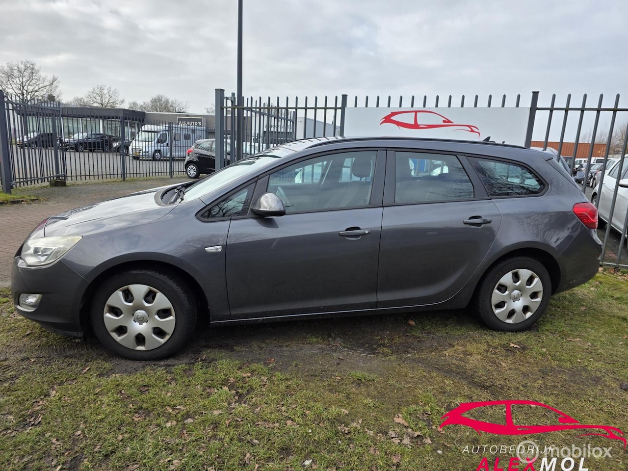 Opel Astra Sports Tourer - 1.4 Cosmo 1.4 Cosmo - AutoWereld.nl