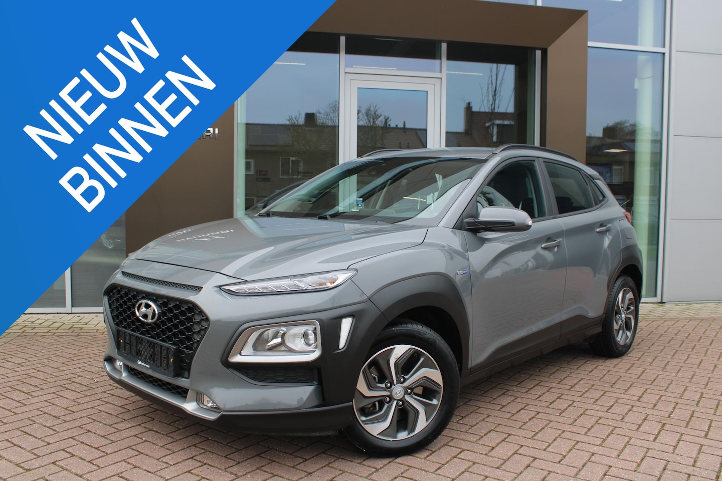 Hyundai Kona - 1.6 GDI HEV 140pk Comfort Smart Automaat Hybrid Airco Navi Camera Carplay - AutoWereld.nl