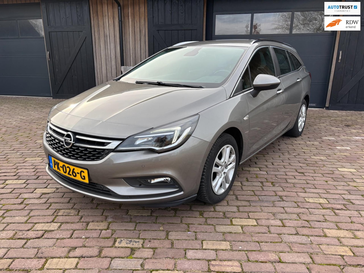 Opel Astra Sports Tourer - 1.0 Online Edition 1.0 Online Edition, CARPLAY, NAVIGATIE,TREKHAAK. - AutoWereld.nl
