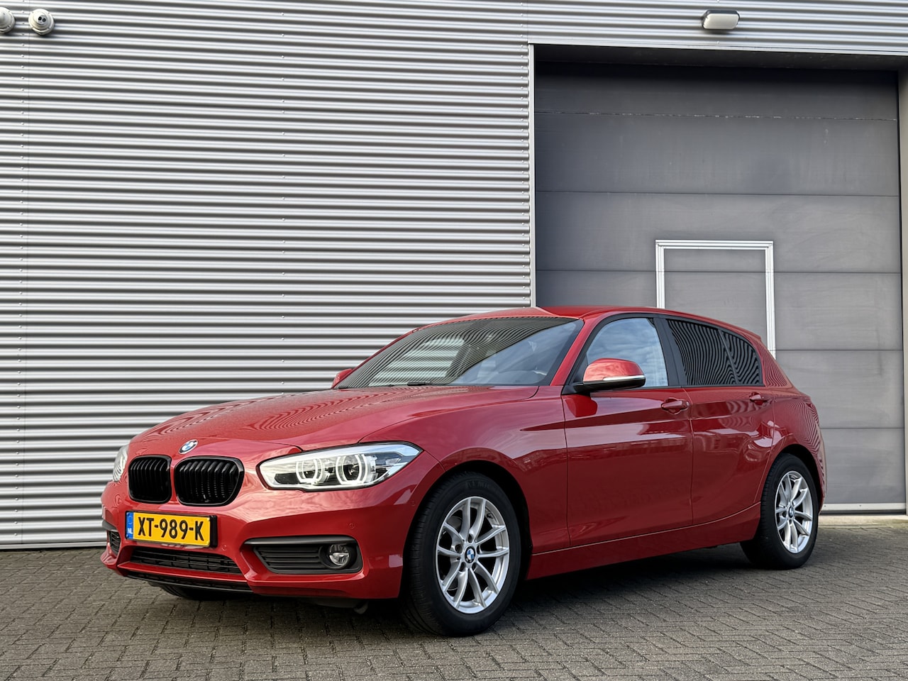 BMW 1-serie - 118i High Executive I Automaat I Navi I Leder - AutoWereld.nl