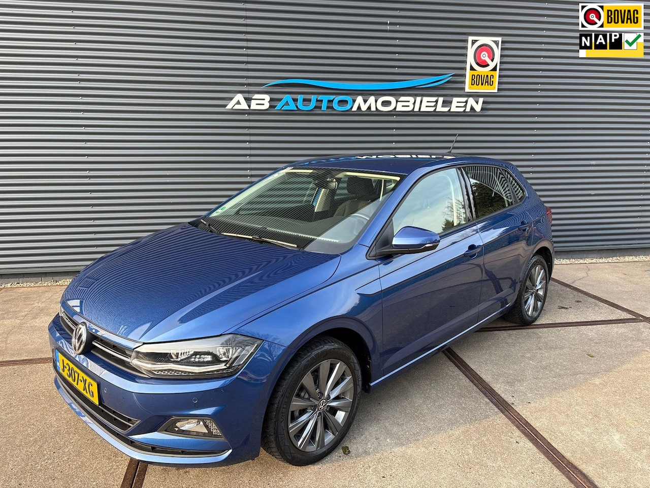 Volkswagen Polo - 1.0 TSI Comfortline Business AUTOMAAT/ PDC/ XENON - AutoWereld.nl