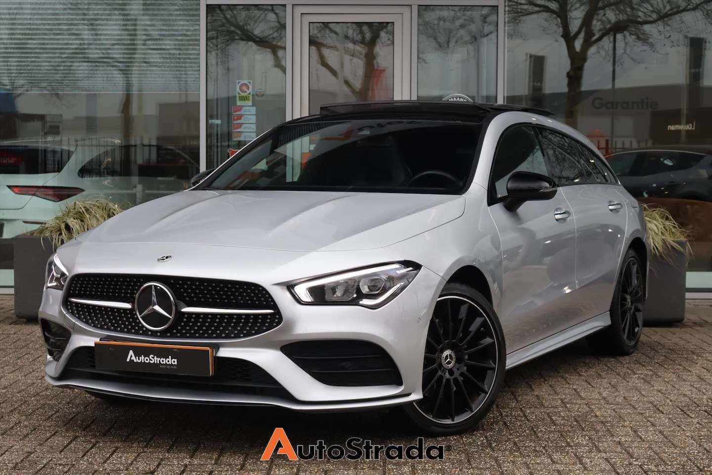 Mercedes-Benz CLA-klasse Shooting Brake - 250e AMG-Line 218pk | Sfeer | Camera | Pano | Cruise | Climate | Navi | LED | Night Pakket - AutoWereld.nl