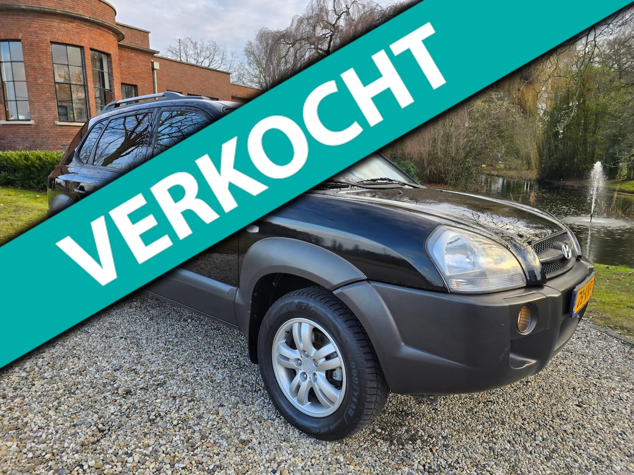 Hyundai Tucson - 2.0i Style LPG/airco/CRUISE *apk:10-2026* - AutoWereld.nl