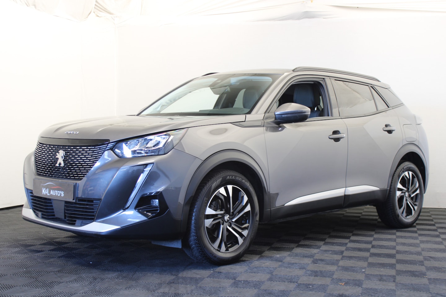 Peugeot 2008 - 1.2 PureTech Allure |Camera|Navi| - AutoWereld.nl