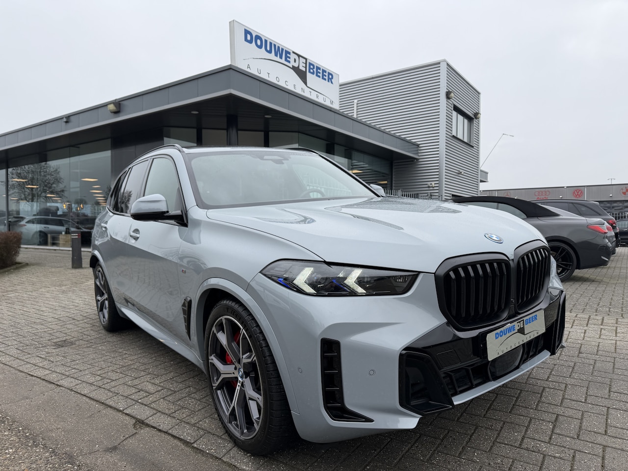 BMW X5 - xDrive50e M Sport Pro Skylounge | Comfort Stoel | Brooklyn | Softclose | Iconic Glow - AutoWereld.nl