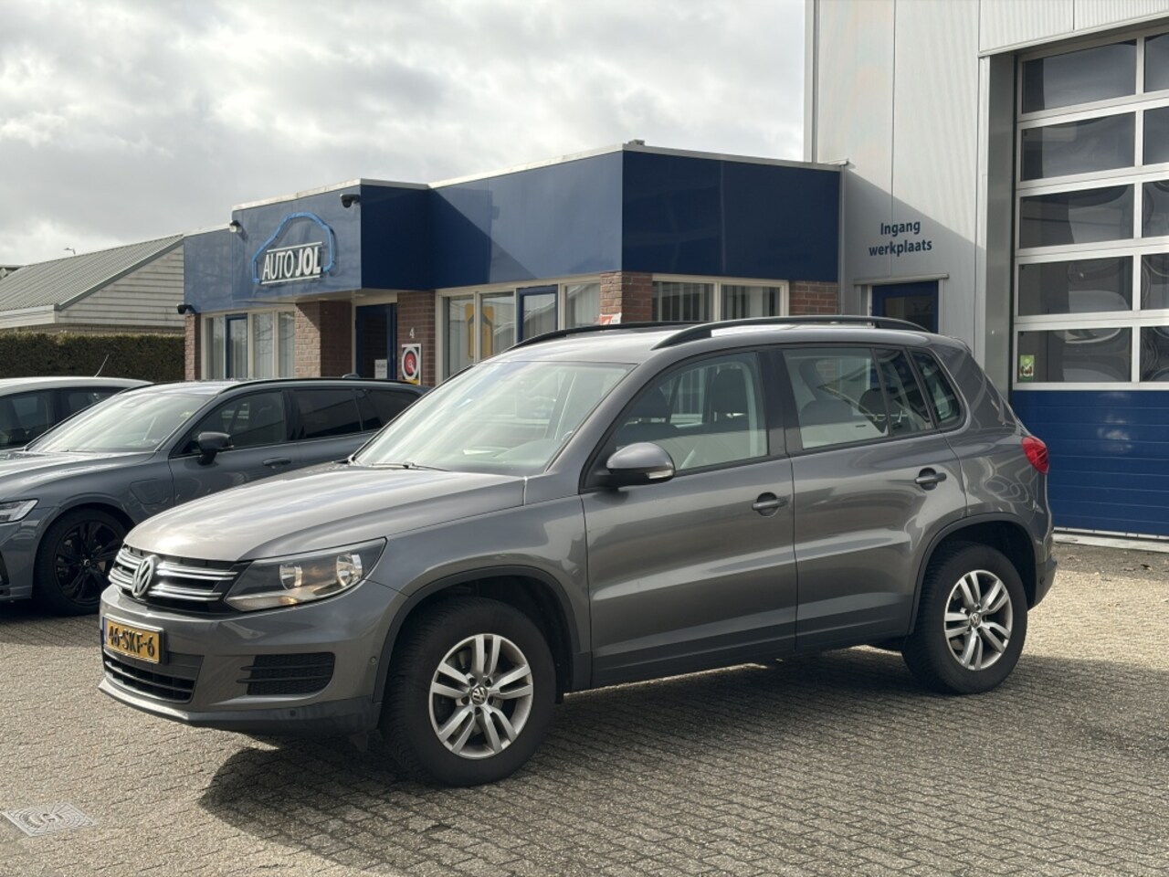 Volkswagen Tiguan - 1.4 TSI Comf.&Design|Trekhaak|Airco|RIJKLAARPRIJS - AutoWereld.nl