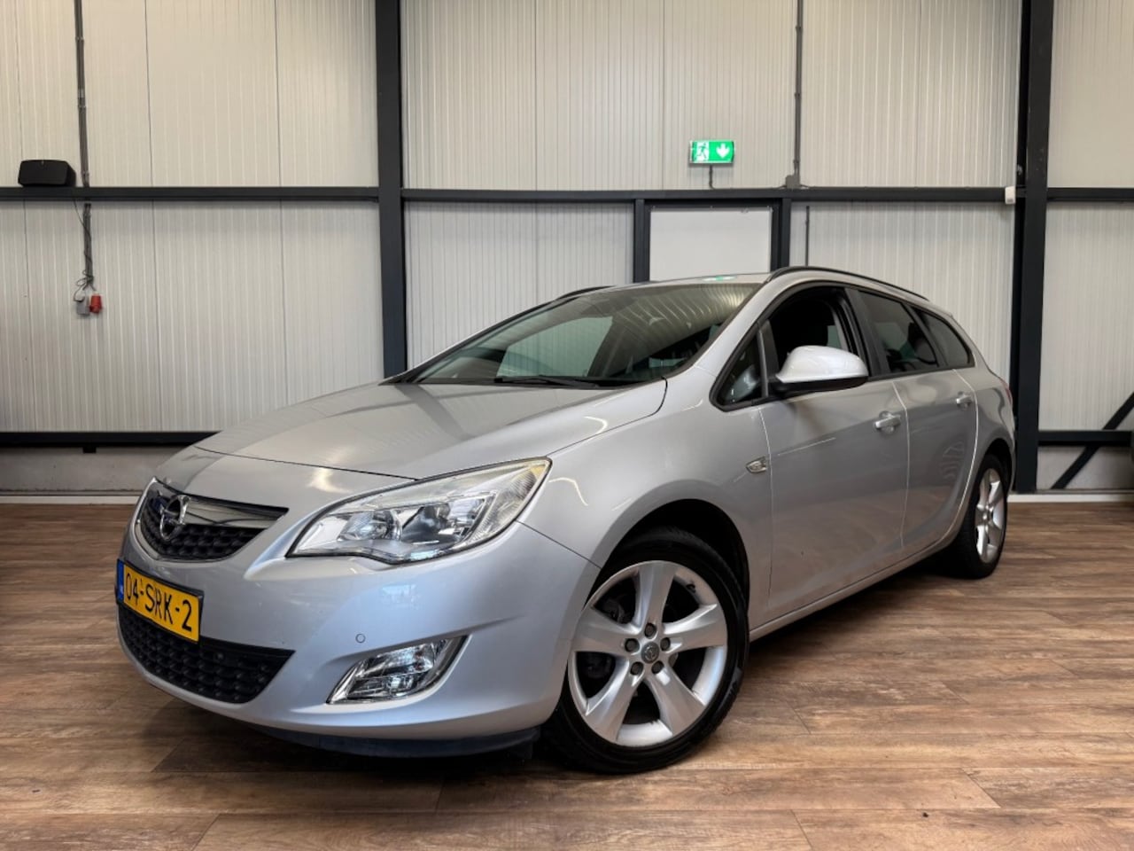 Opel Astra Sports Tourer - Sports Tourer 1.4 Turbo Sport / CRUISE / AIRCO / NAVI / - AutoWereld.nl